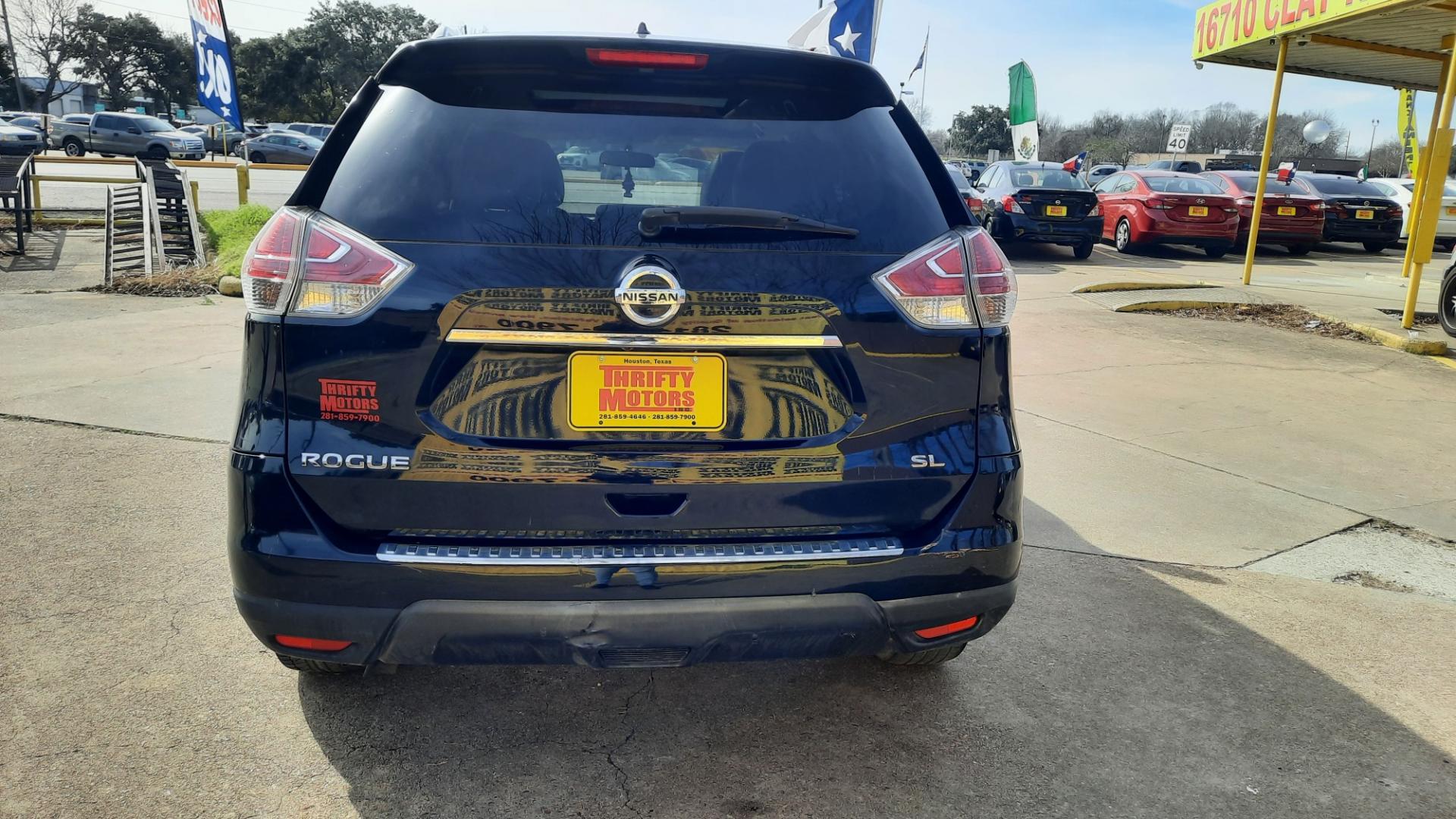 2015 Nissan Rogue (5N1AT2MT7FC) , located at 16710 Clay Rd., Houston, TX, 77084, (281) 859-7900, 29.834864, -95.656166 - Photo#1